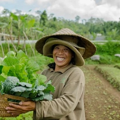 Happy Farmer Holding Fresh Produce